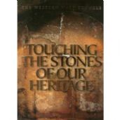 Touching the stones of the heritage